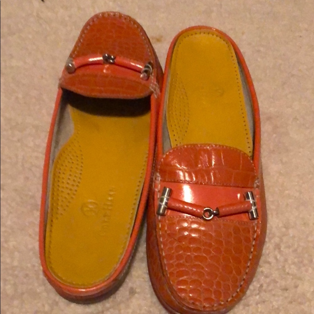 Orange leather slides